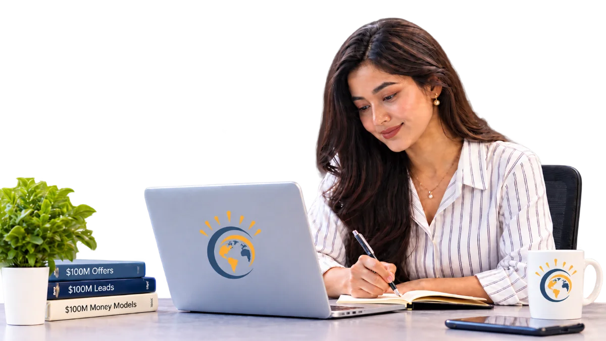 An Apollo professional taking notes beside a laptop carrying the Apollo mark