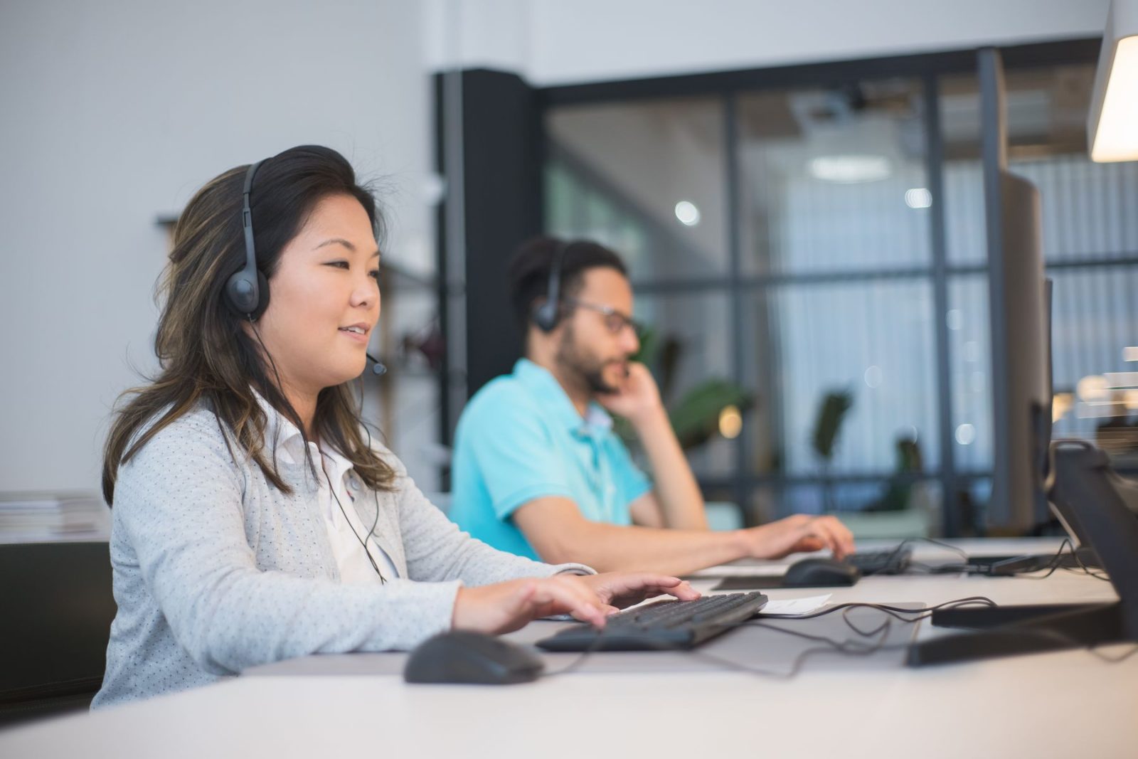 A working floor with colleagues at their computers