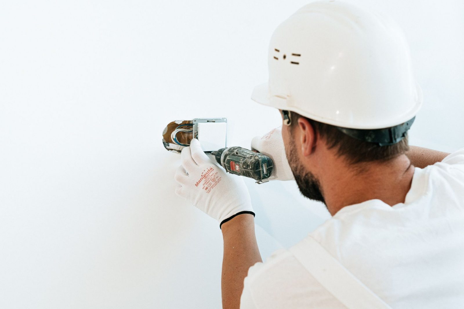 A maintenance technician working on site